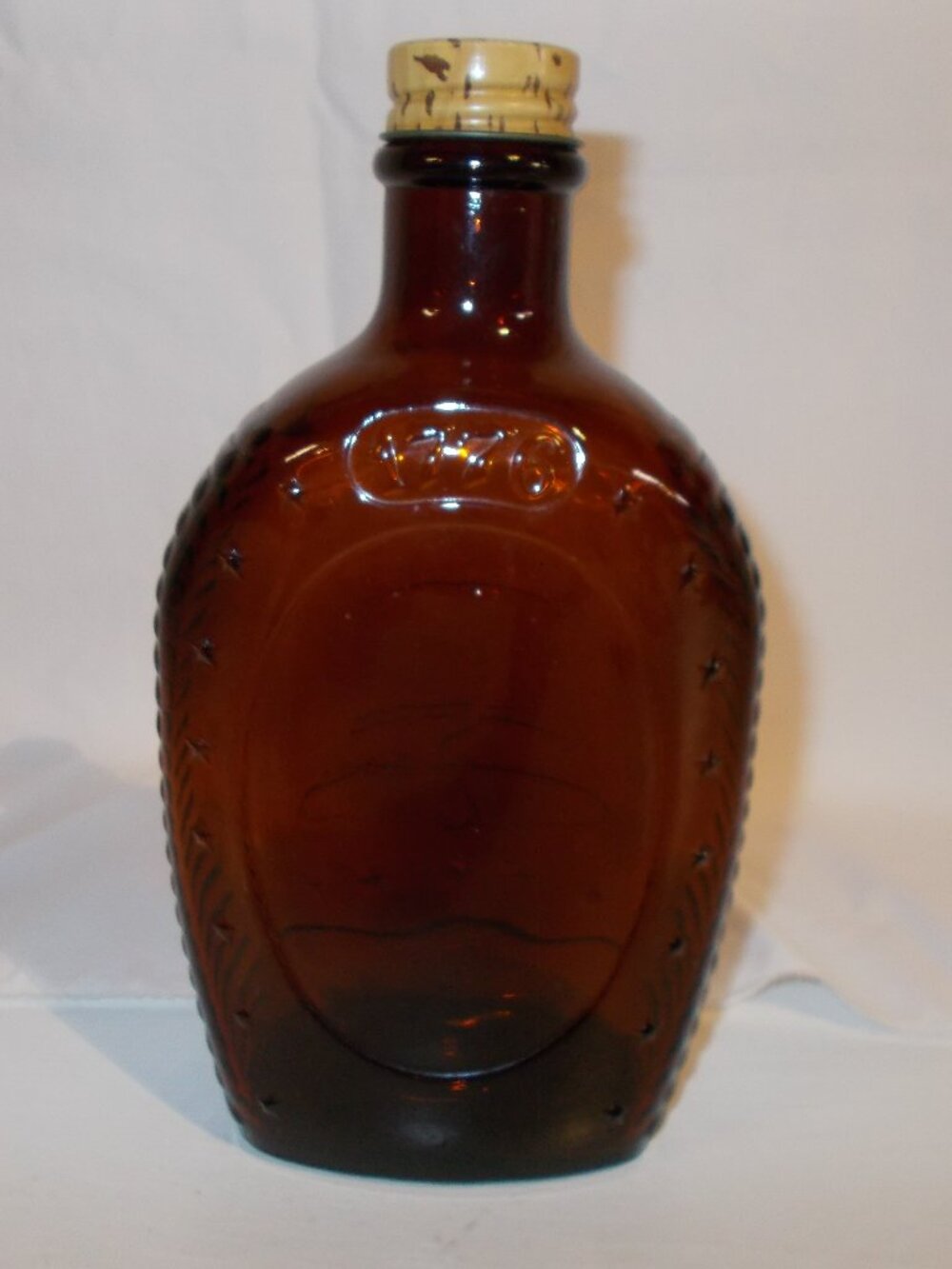 1976 Vintage Log Cabin Syrup Liberty Bell bicentennial bottle, amber color EMPTY